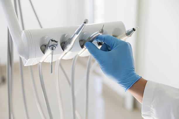 Professional Tooth Extraction technician working in Lopezville, TX